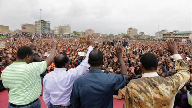 Members of the The National Super Alliance (NASA) including Odinga appear on stage in front of supporters after the supreme court decision was announced