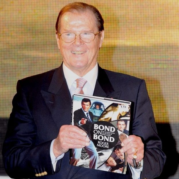 Roger Moore at a book signing in 2012