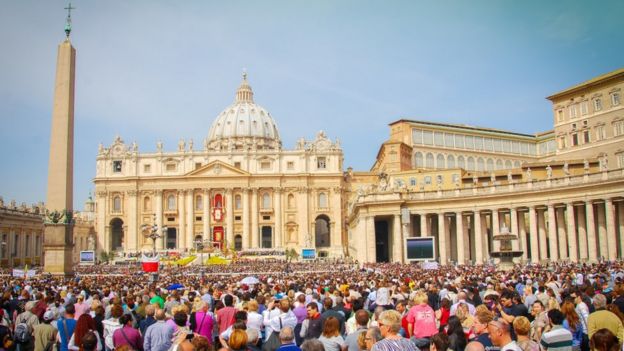 Crowds gather outside St. Peter's Basillica in Rome to hear the Pope speak on Easter Sunday 2011