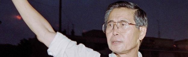 Alberto Fujimori waving as he leaves the residence of the Japanese ambassador in Lima, 22 April 1997