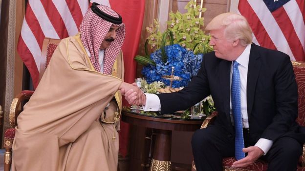 Bahrain's King Hamad shakes hands with US President Donald Trump in Riyadh on 21 May 2017