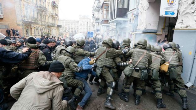 National Guard officers clash with supporters of Georgian former President Mikheil Saakashvili