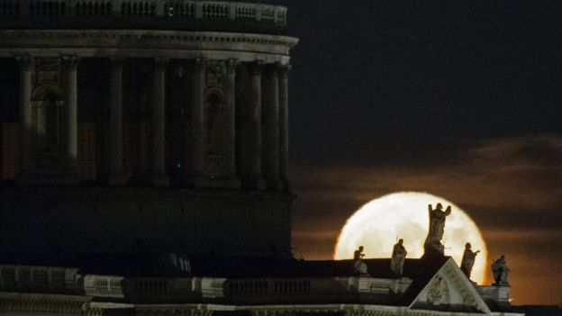 A supermoon rises behind St Paul's Cathedral in London last year.