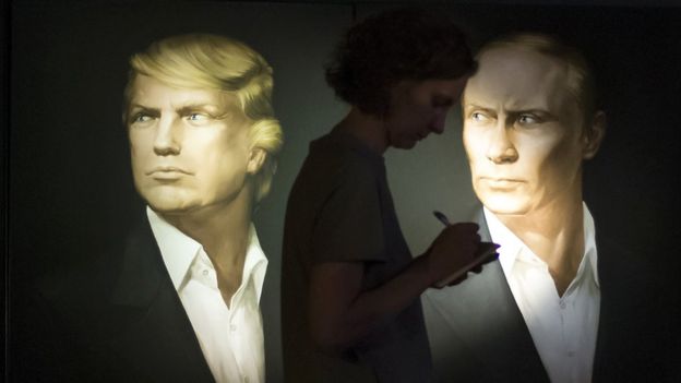 Portraits of Donald Trump and Vladimir Putin on display in a Moscow pub