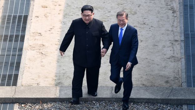 Kim Jong-un and Moon Jae-in walk in the DMZ