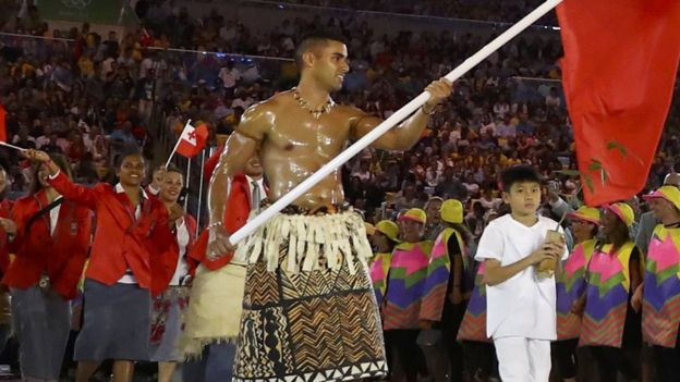 Flagbearerfor Tonga Pita Nikolas Taufatofua at the 2016 Olympics in Spain