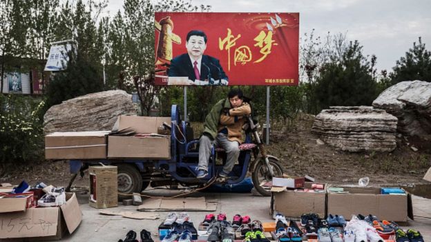 A vendor in a Chinese city under a 