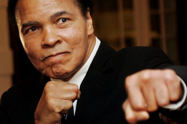 U.S. boxing great Muhammad Ali poses during the Crystal Award ceremony at the World Economic Forum (WEF) in Davos, Switzerland January 28, 2006.