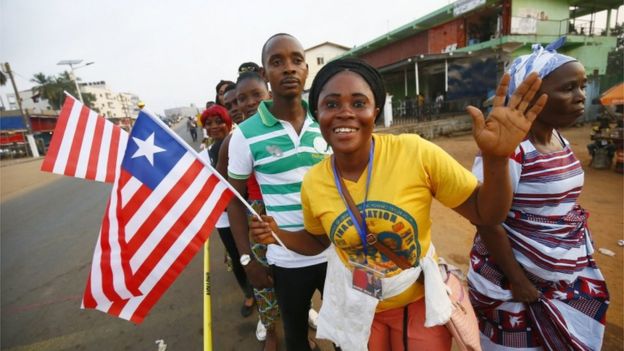 Liberians cheer as they stand in line to enter the inauguration off the President-elect, George Weah, at the Samuel Kanyon Doe stadium, in Monrovia, Liberia, 22 January 2018.
