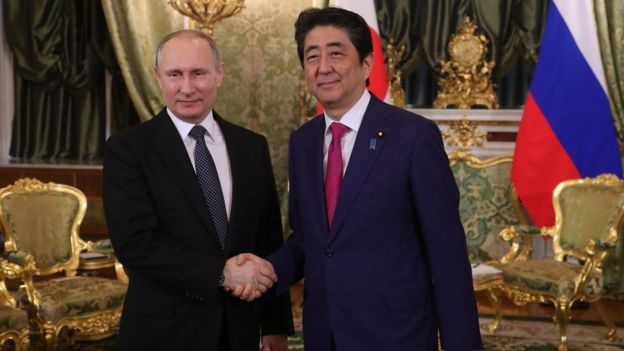 Russian President Vladimir Putin (L) shakes hands with Japanese Prime Minister Shinzo Abe (R) during their meeting at the Kremlin in Moscow, Russia, 27 April 2017