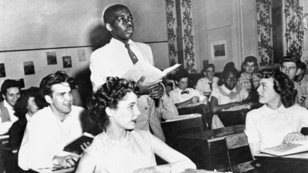 A black student stands in a high school at school in Washington in 1954 following the ruling