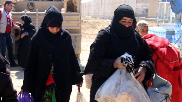 Displaced civilians from Hawija arrive at a temporary camp near Kirkuk on 8 March 2017