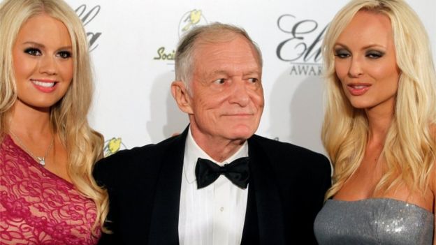 Playboy magazine founder Hugh Hefner and girlfriends Anna Sophia Berglund (L) and Shera Bechard pictured in 2011