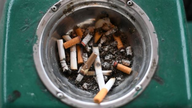 ashtray with cigarette butts