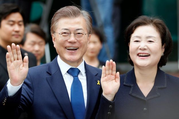 Moon Jae-in (L), presidential candidate of the Democratic Party of Korea (The Minjoo Party of Korea), and wife Kim Jeong-suk, pose for a photo after casting their ballots at a polling station in a junior high-school in Seoul, South Korea, 9 May 2017