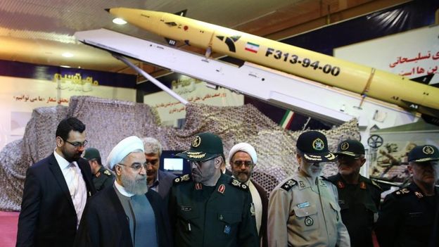 Iranian President Hassan Rouhani (2nd L) and Defence Minister Hossein Dehghan (C) attend a ceremony to unveil a new version of the Fateh-313 surface-to-surface missile (22 August 2015)