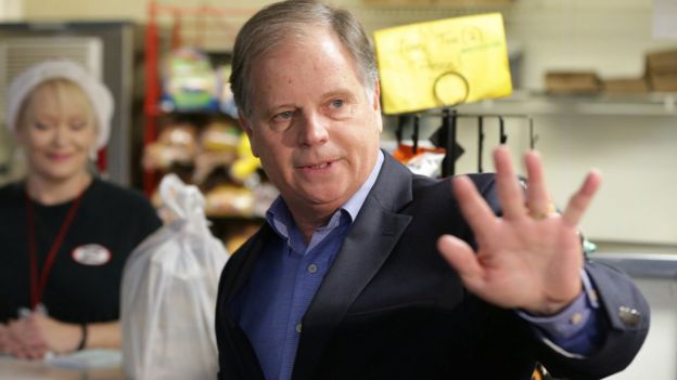 Democratic Alabama U.S. Senate candidate Doug Jones greets the media