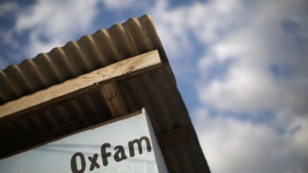 Oxfam sign in displaced people camp in Haiti