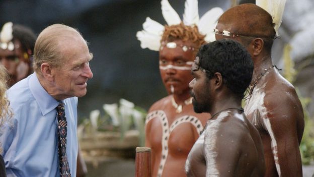 Prince Philip speaking to Aborigine performers in 2002
