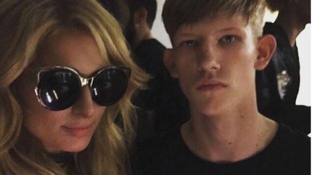 Connor with Paris Hilton at a fashion show after-party