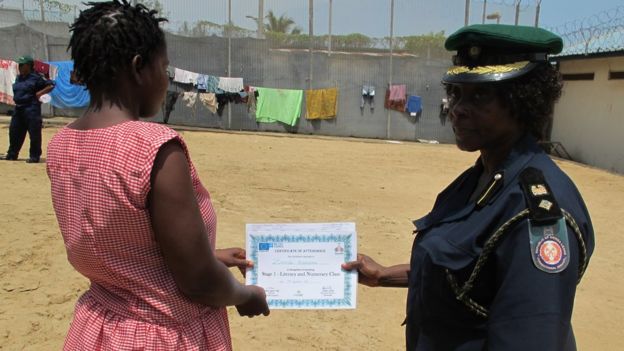 Correctional office gives certificate to student