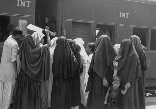 Muslim women board a train in Delhi to travel to Pakistan on 7 August 1947