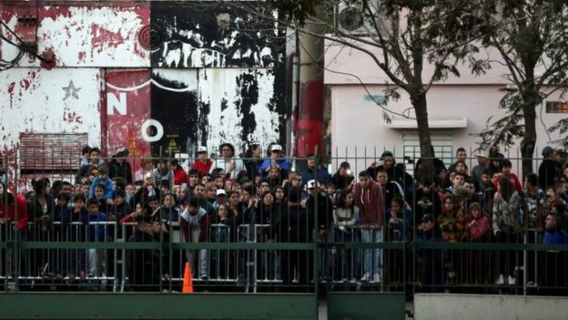 Crowds outside the hotel where Lionel Messi's wedding takes place in Rosario, Argentina. Photo: 30 June 2017