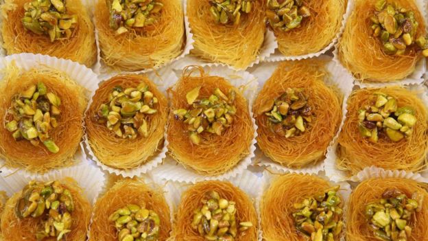 Pastries topped with pistachios