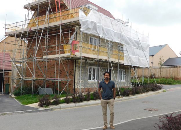 Pritesh Patel in front of his house