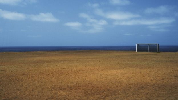 arco en campo y mar