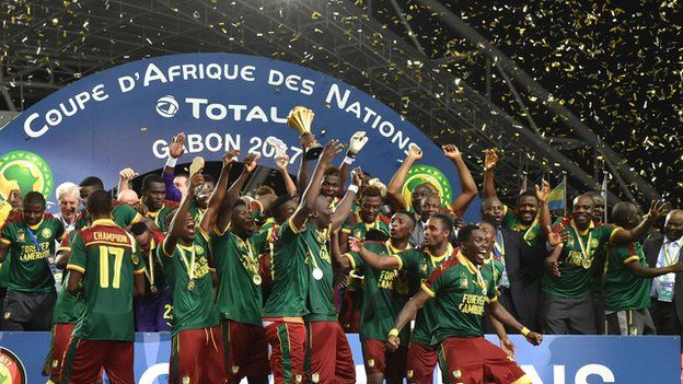 Cameroon celebrate with the Nations Cup trophy