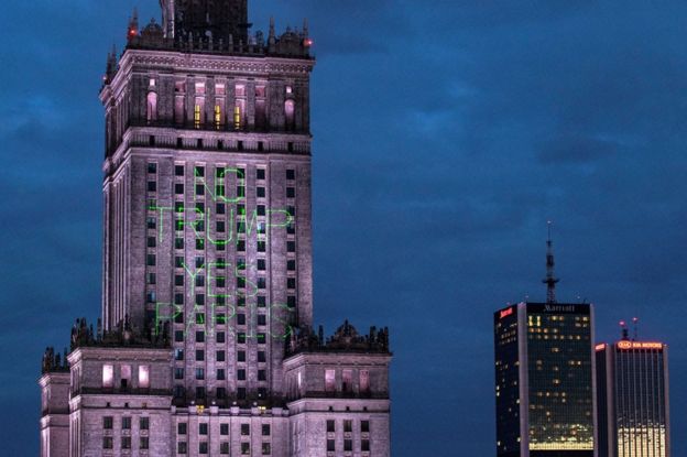 Greenpeace activist illuminate the Palace of Culture and Science with words 