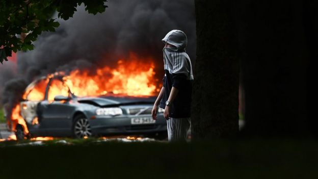 Masked men attack Police who attended the scene of young people throwing stones and damaging cars in east Belfast