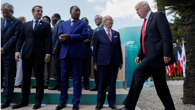 U.S. President Donald Trump arrives next to R-L: Tunisia