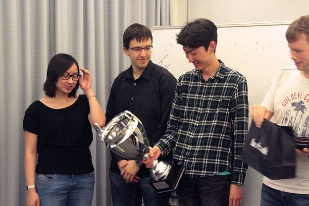 Winning team members Stella Lau, Will Shackleton, Cheng Sun, and Gábor Szarka.