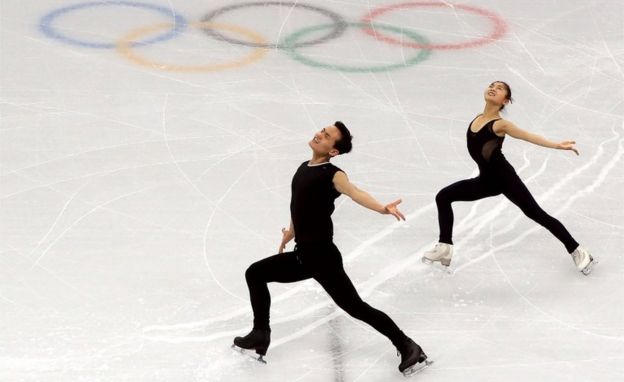 Figure skaters Ryom Tae-ok (R) and Kim Ju-sik of North Korea practice at Gangneung Ice Arena in Pyeongchang