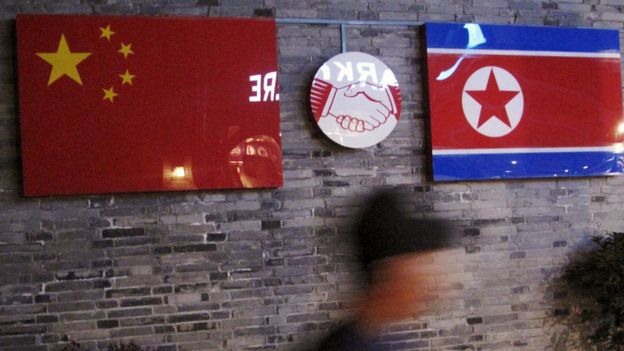 File photo: Flags of China and North Korea are seen outside the closed Ryugyong Korean Restaurant in Ningbo, Zhejiang province, China, 12 April, 2016