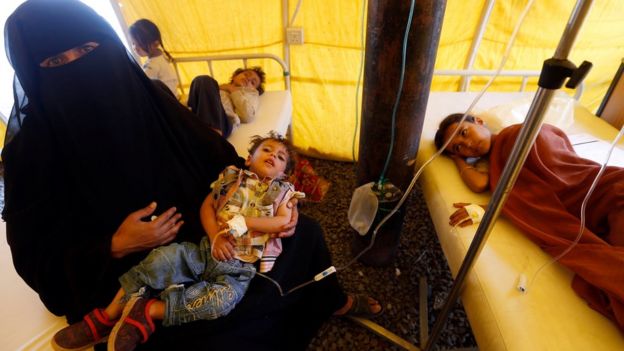 Yemeni children suspected of being infected with cholera receive treatment at a makeshift hospital in Sanaa on 5 June 2017