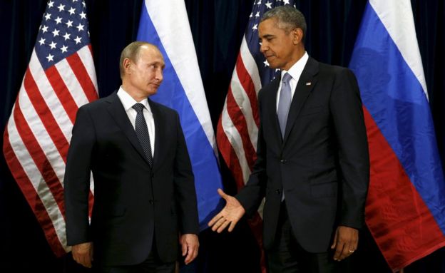 US President Barack Obama extends his hand to Russian President Vladimir Putin during their meeting at the United Nations General Assembly in New York, September 28, 2015.