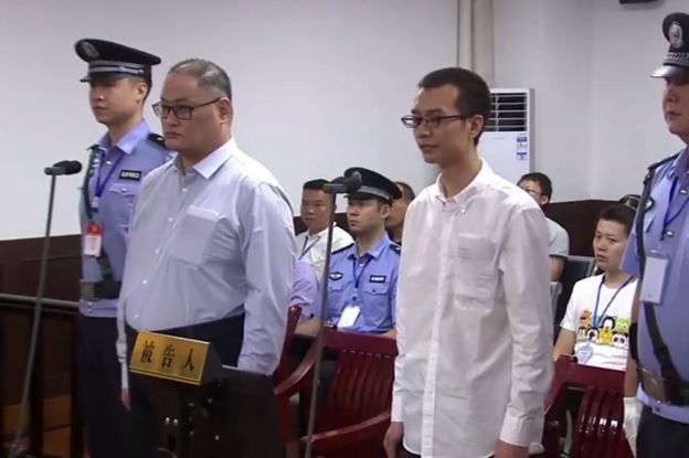 This video grab from footage on the website of Yueyang Intermediate People's Court taken on September 11, 2017 shows Taiwanese activist Lee Ming-che (2nd L) appearing in court in Yueyang in China's central Hunan province.