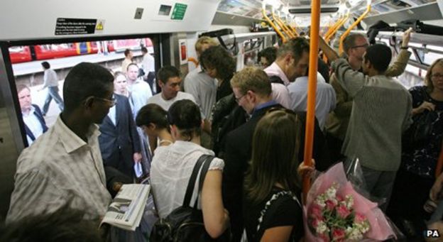 Commuters on overcrowded train