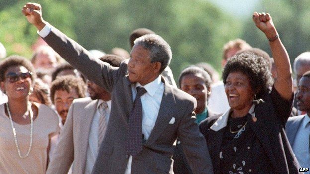 ANC leader Nelson Mandela and his then wife Winnie raise fists upon his release from Victor Verster prison, 11 February 1990 in Paarl, South Africa