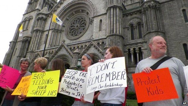 Protesters against clerical child abuse gather outside the Cathedral Basilica in St. Louis in June 2014