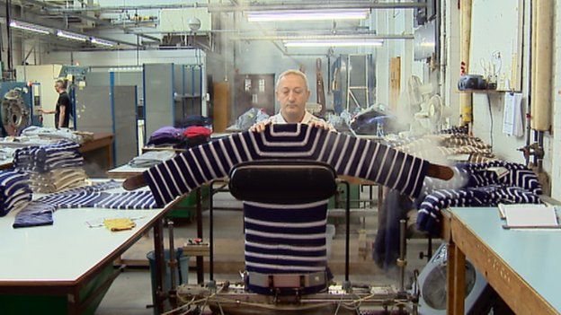 Knitwear being steamed