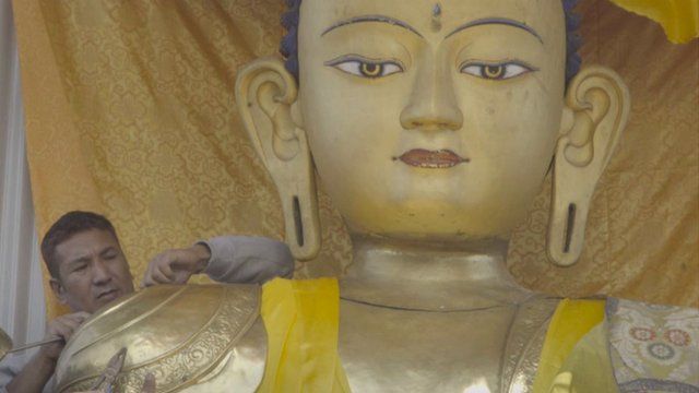 Metalworker Binod Sakya works at Swayambhunath temple, Kathmandu, Nepal