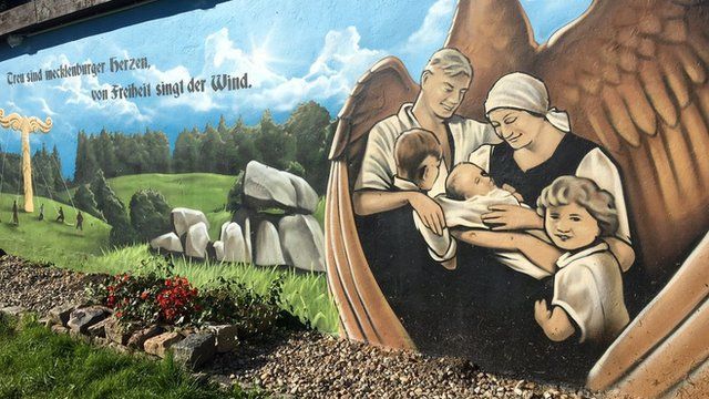 Mural of family in Jamel