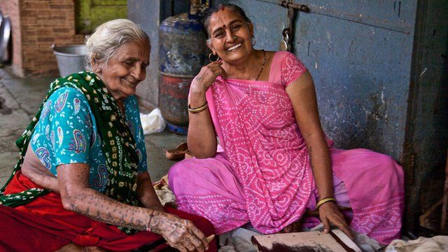 Women preparing food for a wedding in Mumbai