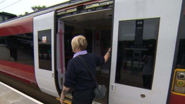 Guard outside train