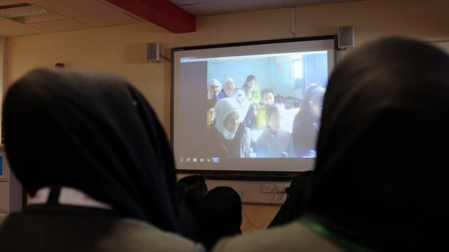 Students from Oaklands School in Tower Hamlets during a link-up with a school in Damascus, Syria