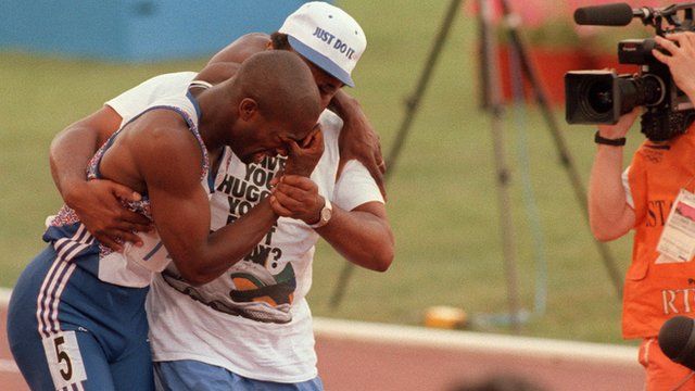 Derek Redmond with his father at the Barcelona Olympics